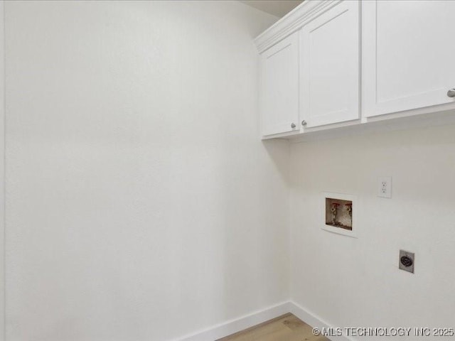 817 N Ivy St, Jenks, OK 74037 - laundry area with cabinet space, hookup for an electric dryer, washer hookup, baseboards, and light wood finished floors