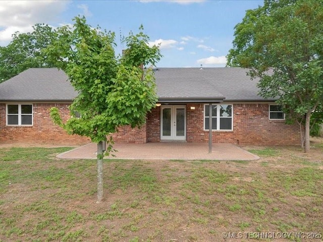 817 N Ivy St, Jenks, OK 74037 - rear view of property with french doors, a yard, a patio area, and brick siding