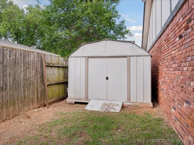 817 N Ivy St, Jenks, OK 74037 - view of shed featuring a fenced backyard