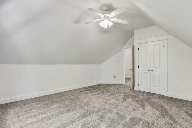 900 W Hardesty Rd, Caddo, OK 74729 - bonus room featuring carpet, lofted ceiling, baseboards, and a ceiling fan