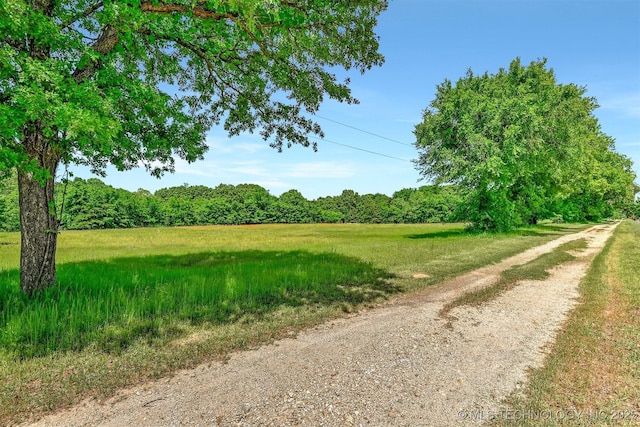 900 W Hardesty Rd, Caddo, OK 74729 - view of street with a view of trees