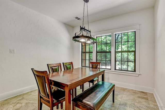 900 W Hardesty Rd, Caddo, OK 74729 - dining room with baseboards