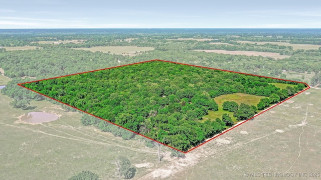 900 W Hardesty Rd, Caddo, OK 74729 - aerial overview of property's location featuring property parcel outlined