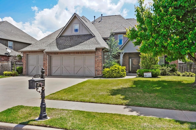 12643 S 67th E Ave, Bixby, OK 74070 - view of front of house with driveway, brick siding, an attached garage, and roof with shingles