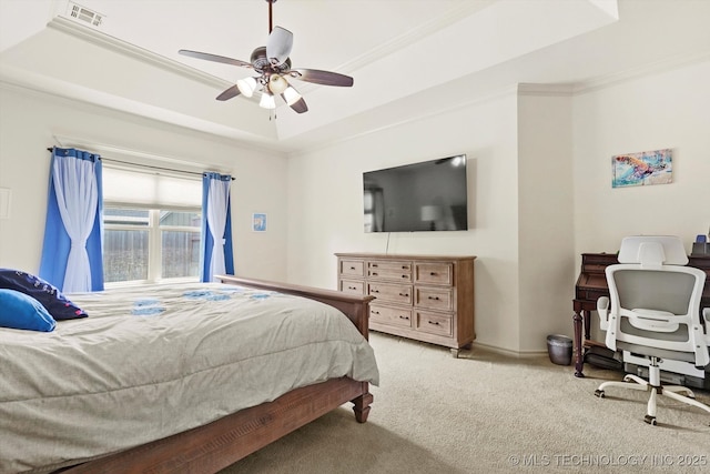 12643 S 67th E Ave, Bixby, OK 74070 - bedroom with crown molding, light carpet, a tray ceiling, ceiling fan, and baseboards