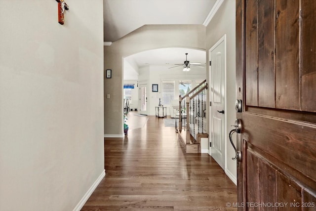 12643 S 67th E Ave, Bixby, OK 74070 - entrance foyer with ceiling fan, wood finished floors, arched walkways, baseboards, and stairs