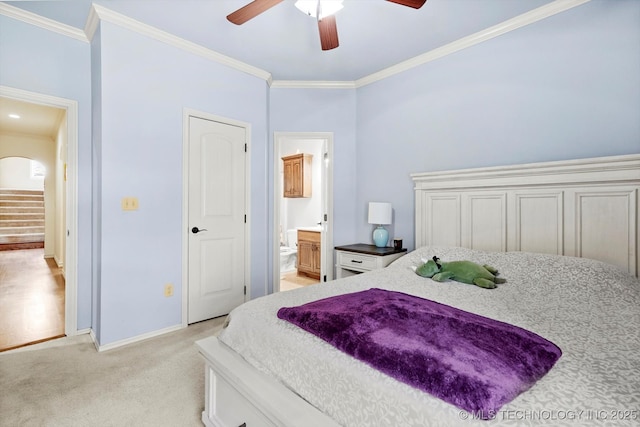 12643 S 67th E Ave, Bixby, OK 74070 - bedroom with ornamental molding, baseboards, connected bathroom, light colored carpet, and a ceiling fan