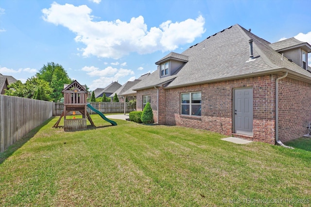 12643 S 67th E Ave, Bixby, OK 74070 - view of yard featuring a playground