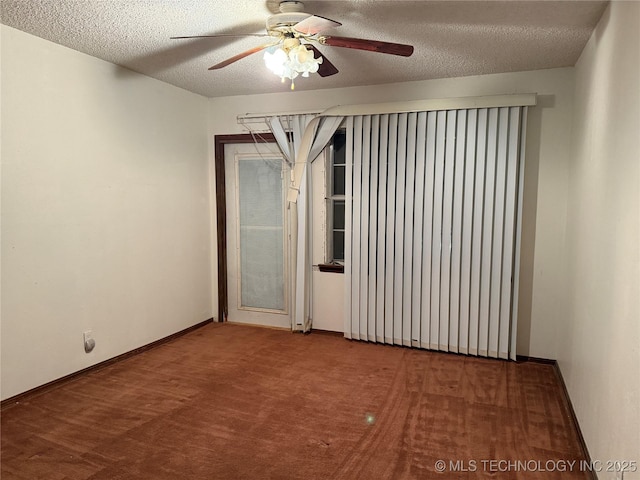 2099 S 80th St E, Muskogee, OK 74403 - carpeted spare room with a ceiling fan, a textured ceiling, and baseboards
