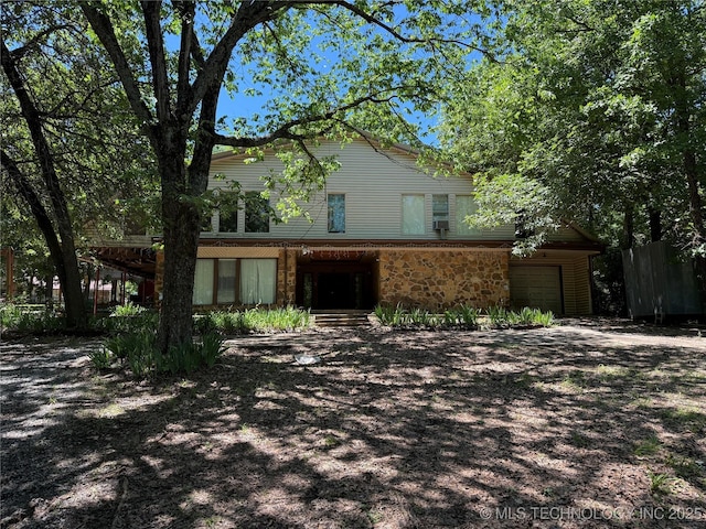 2099 S 80th St E, Muskogee, OK 74403 - view of front of home featuring stone siding