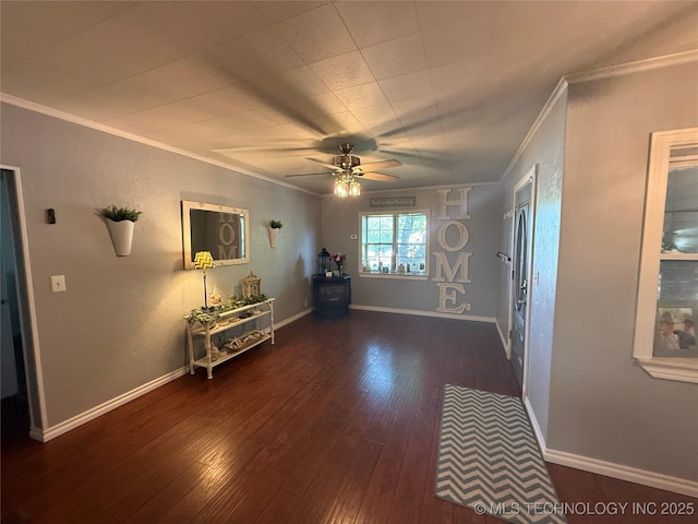 1732 N Little, Cushing, OK 74023 - spare room featuring crown molding, wood-type flooring, a ceiling fan, and baseboards