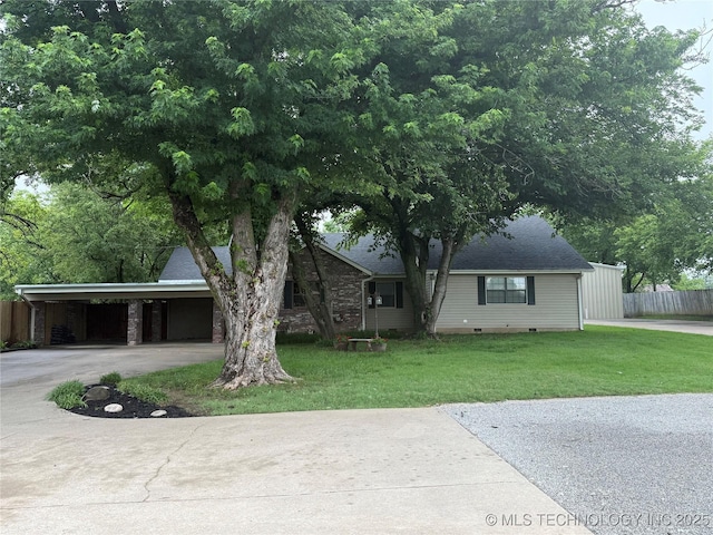 1732 N Little, Cushing, OK 74023 - view of front of home with driveway, crawl space, roof with shingles, and a carport