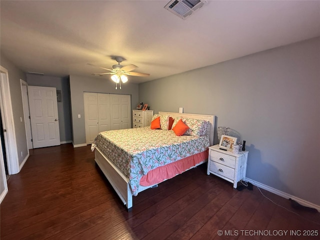 1732 N Little, Cushing, OK 74023 - bedroom featuring dark wood finished floors, a closet, and baseboards