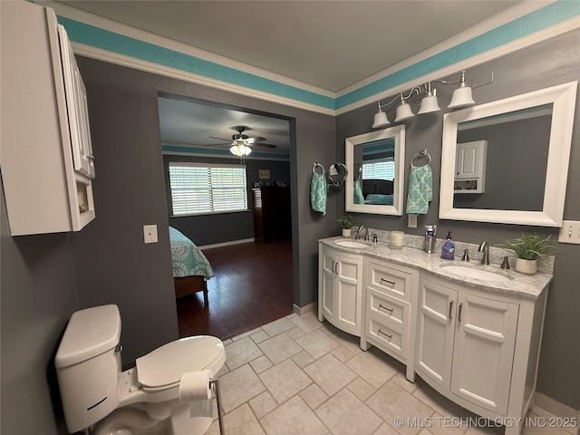 1732 N Little, Cushing, OK 74023 - full bath with double vanity, baseboards, ceiling fan, ensuite bathroom, and crown molding