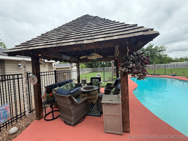 1732 N Little, Cushing, OK 74023 - view of pool featuring a gazebo, a fenced backyard, an outdoor living space with a fire pit, and a patio