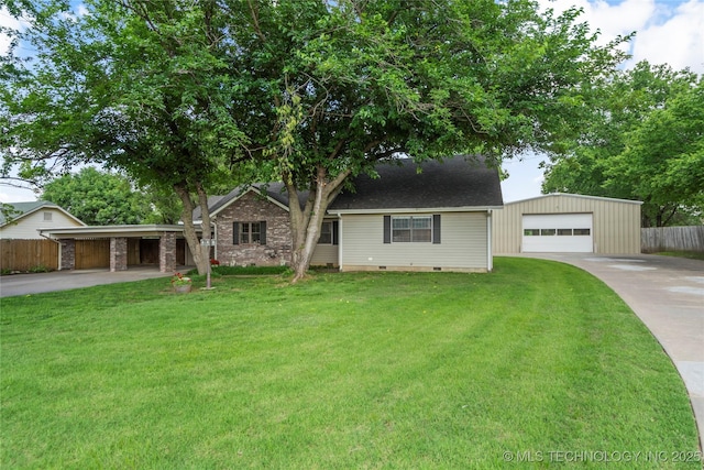 1732 N Little, Cushing, OK 74023 - view of front of house featuring an outdoor structure, concrete driveway, crawl space, a shingled roof, and a detached garage