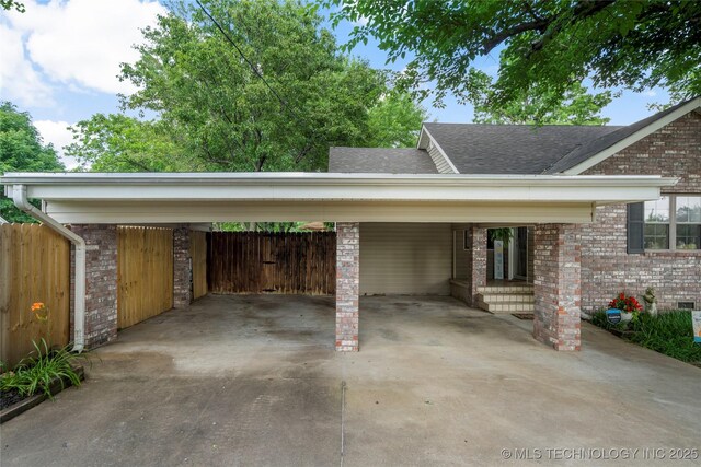 1732 N Little, Cushing, OK 74023 - view of parking with a carport and concrete driveway