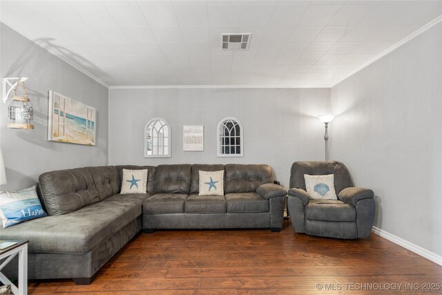 1732 N Little, Cushing, OK 74023 - living area with ornamental molding and dark wood-type flooring