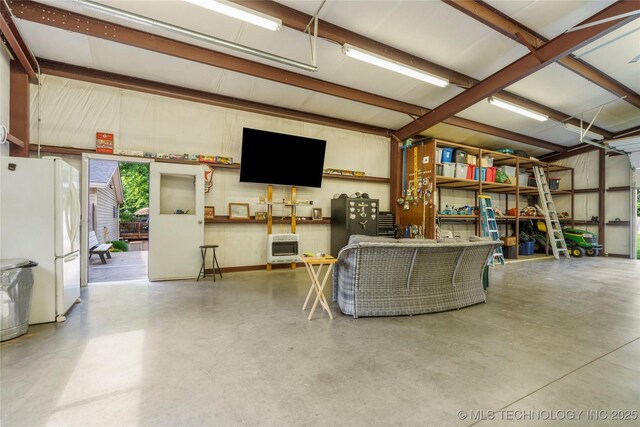 1732 N Little, Cushing, OK 74023 - garage with freestanding refrigerator