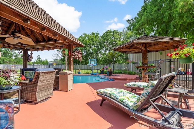1732 N Little, Cushing, OK 74023 - view of pool with a gazebo, a fenced backyard, a patio area, and ceiling fan