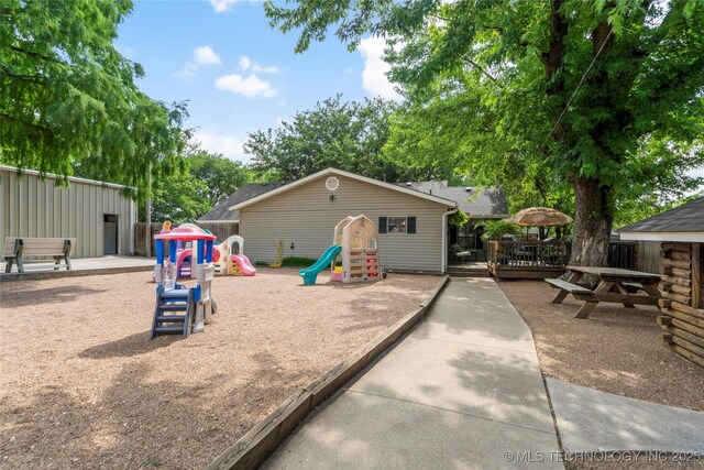 1732 N Little, Cushing, OK 74023 - rear view of house featuring a wooden deck