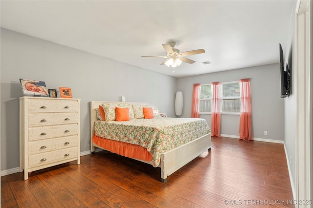 1732 N Little, Cushing, OK 74023 - bedroom with dark wood finished floors and ceiling fan