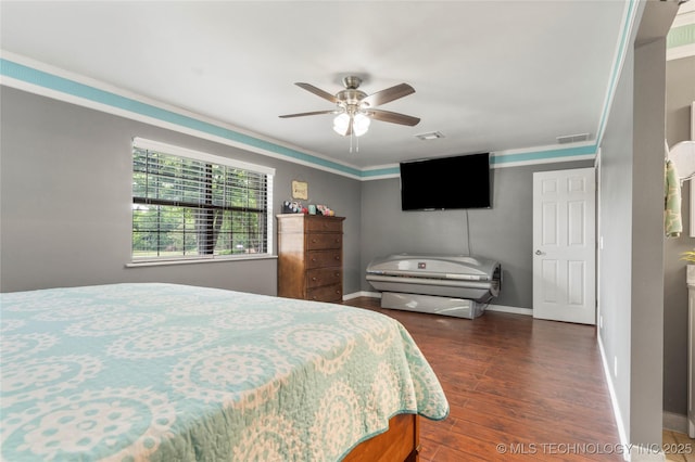 1732 N Little, Cushing, OK 74023 - bedroom with wood finished floors, ceiling fan, and crown molding