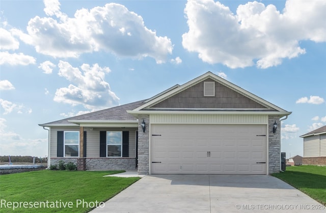 8500 E Queens St, Broken Arrow, OK 74014 - ranch-style home with driveway, stone siding, a garage, and a front yard