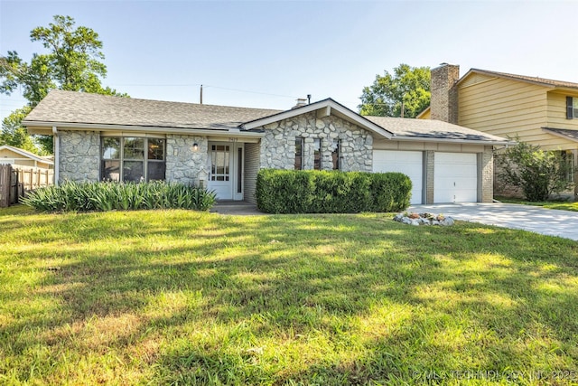 9429 E 36th St, Tulsa, OK 74145 - view of front of house with stone siding, a garage, driveway, and a chimney