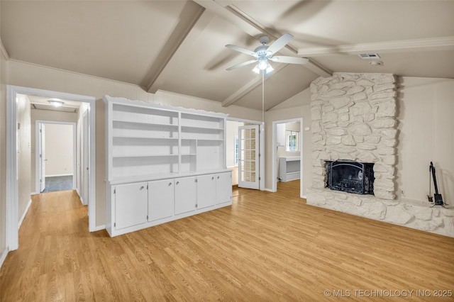 9429 E 36th St, Tulsa, OK 74145 - unfurnished living room featuring ceiling fan, light wood finished floors, a fireplace, and baseboards