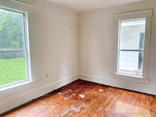 419 Minor St, Tahlequah, OK 74464 - unfurnished room featuring wood finished floors and baseboards
