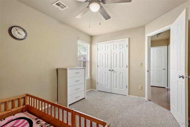 20225 E 44th St S, Broken Arrow, OK 74014 - bedroom with carpet, a closet, baseboards, and ceiling fan