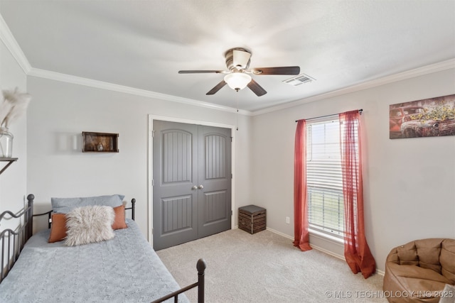 5720 E 144th St N, Collinsville, OK 74021 - carpeted bedroom featuring ornamental molding, a closet, ceiling fan, and baseboards