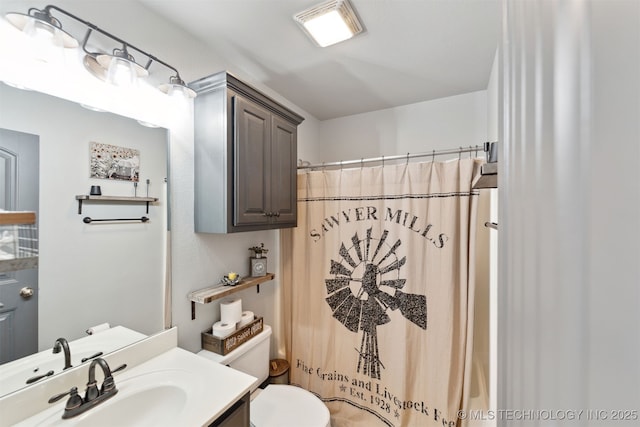 5720 E 144th St N, Collinsville, OK 74021 - bathroom featuring vanity, toilet, and shower / bath combination with curtain