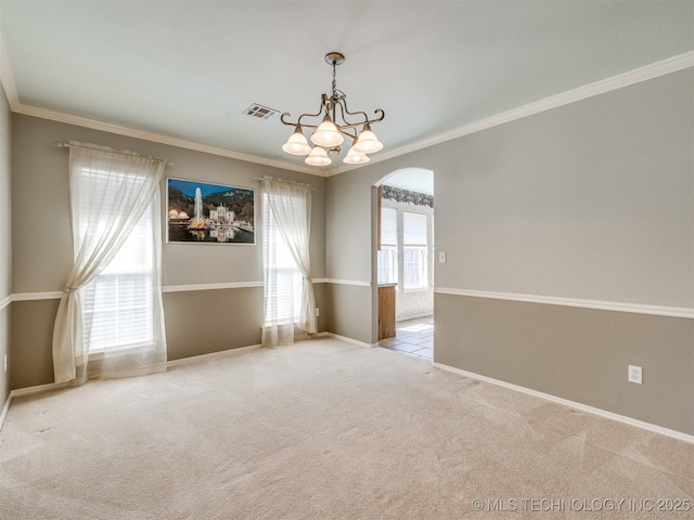 4708 W Indianola St, Broken Arrow, OK 74012 - carpeted spare room with a chandelier, crown molding, arched walkways, and baseboards