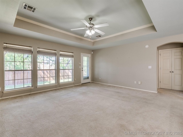 4708 W Indianola St, Broken Arrow, OK 74012 - unfurnished room featuring a tray ceiling, ornamental molding, light carpet, and a ceiling fan