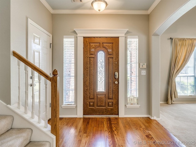 4708 W Indianola St, Broken Arrow, OK 74012 - foyer entrance with stairs, baseboards, wood finished floors, and ornamental molding