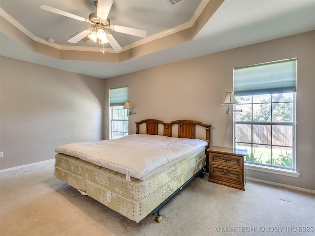 4708 W Indianola St, Broken Arrow, OK 74012 - carpeted bedroom with a raised ceiling, ornamental molding, baseboards, and a ceiling fan