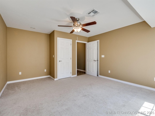 4708 W Indianola St, Broken Arrow, OK 74012 - unfurnished bedroom with light carpet, baseboards, and ceiling fan