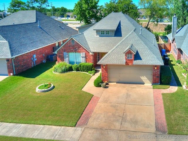 4708 W Indianola St, Broken Arrow, OK 74012 - traditional-style home featuring brick siding, central AC unit, roof with shingles, and concrete driveway