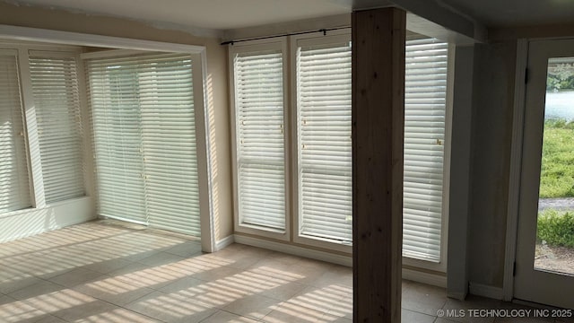 6844 Yonkipin Dr, Claremore, OK 74019 - unfurnished sunroom with healthy amount of natural light