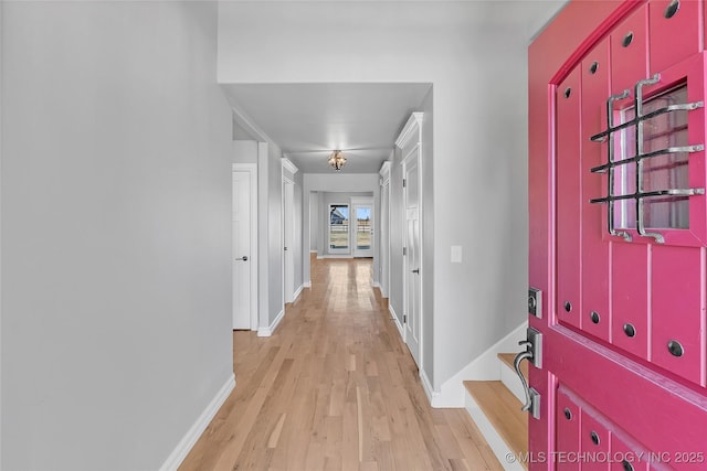 4922 S 81st W Ave, Tulsa, OK 74107 - foyer with light wood-style floors and baseboards