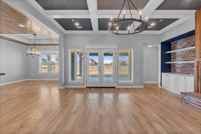 4922 S 81st W Ave, Tulsa, OK 74107 - unfurnished living room featuring a chandelier, baseboards, light wood-style floors, french doors, and coffered ceiling