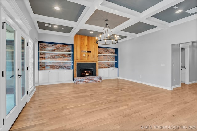 4922 S 81st W Ave, Tulsa, OK 74107 - unfurnished living room with coffered ceiling, light wood-style floors, baseboards, a fireplace, and a chandelier