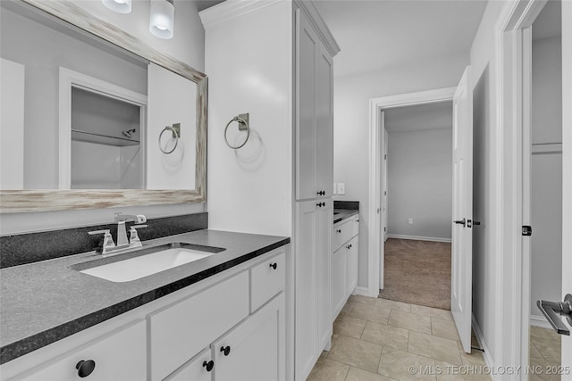4922 S 81st W Ave, Tulsa, OK 74107 - bathroom with vanity and baseboards
