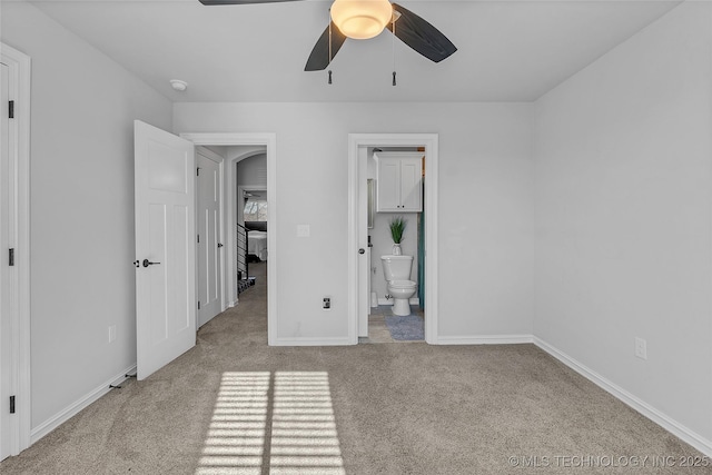 4922 S 81st W Ave, Tulsa, OK 74107 - unfurnished bedroom with carpet, baseboards, ensuite bathroom, and a ceiling fan