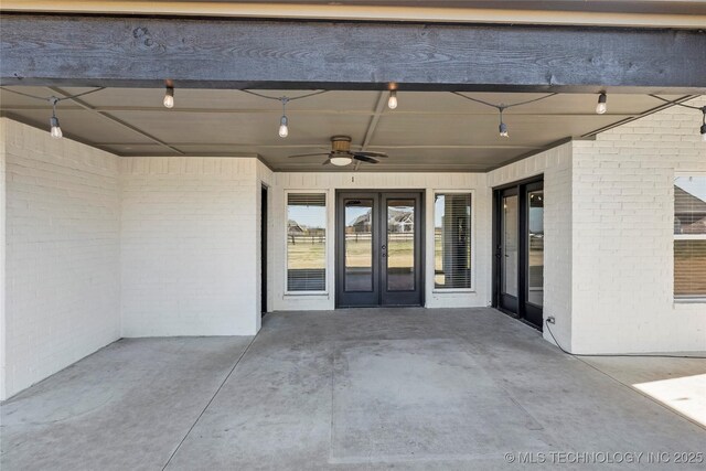 4922 S 81st W Ave, Tulsa, OK 74107 - view of patio / terrace featuring a ceiling fan and french doors