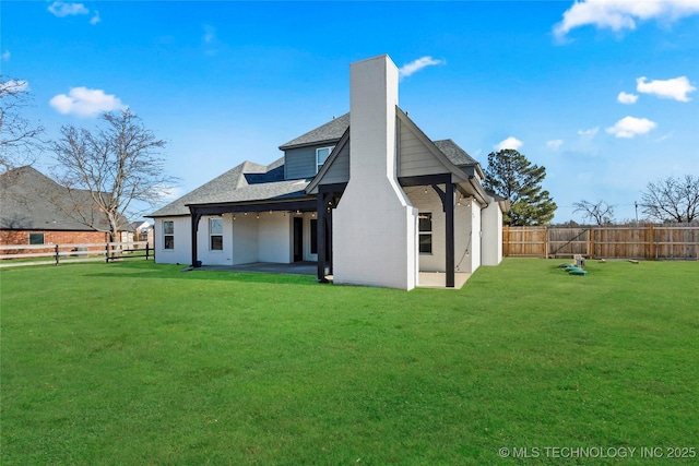 4922 S 81st W Ave, Tulsa, OK 74107 - back of property featuring a chimney, a patio, and a shingled roof