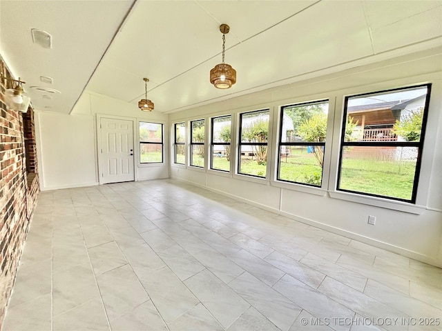 1903 Swan Ln, Mcalester, OK 74501 - unfurnished sunroom with healthy amount of natural light and lofted ceiling