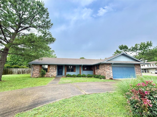 1903 Swan Ln, Mcalester, OK 74501 - ranch-style house featuring driveway, an attached garage, and brick siding